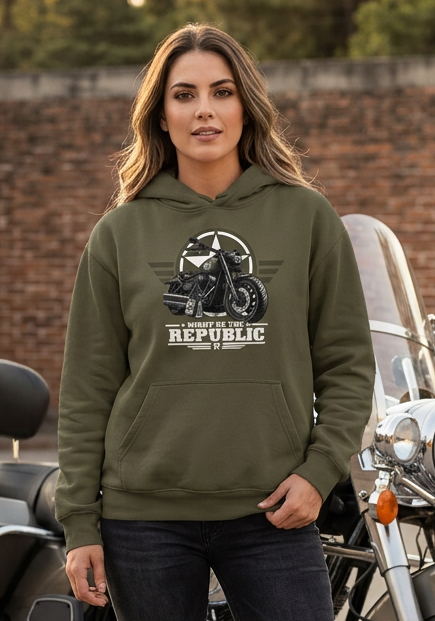 Woman outdoors wearing the olive green HawgDogs Might of The Republic Ultimate Fleece-147 Hoodie showing the front graphic