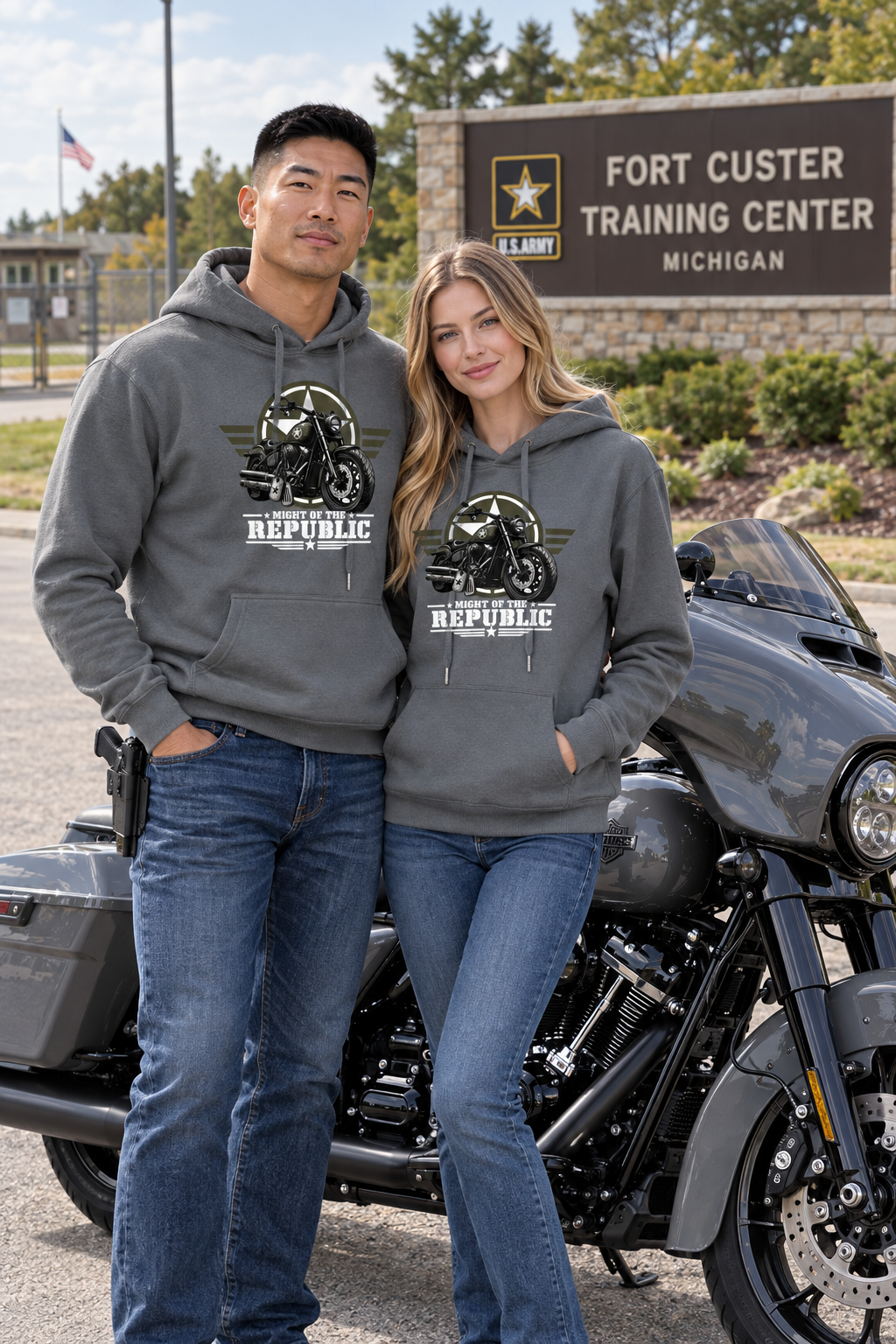 Couple in gray Might of The Republic premium hoodies at Fort Custer Training Center