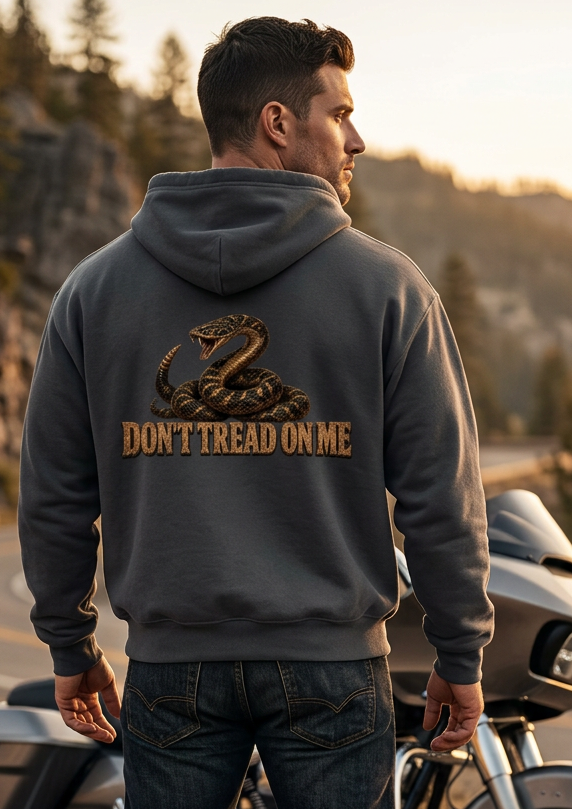 Back view of a man wearing the charcoal gray HawgDogs Don't Tread Doggo Ultimate Fleece-147 Hoodie with the coiled rattlesnake graphic