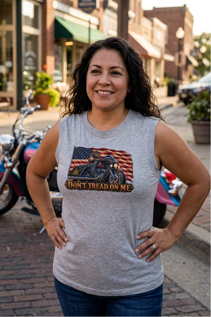 Woman in the gray Don't Tread Doggo women's crewneck tank with motorcycles in town