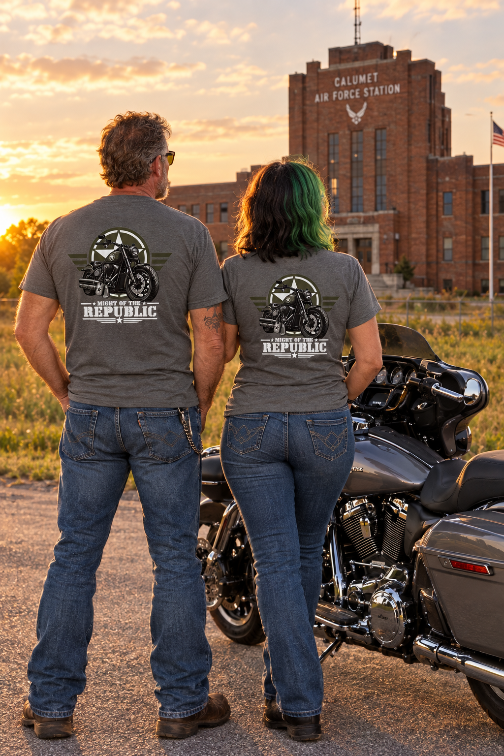 Back of gray Might of The Republic tees on a couple at sunset