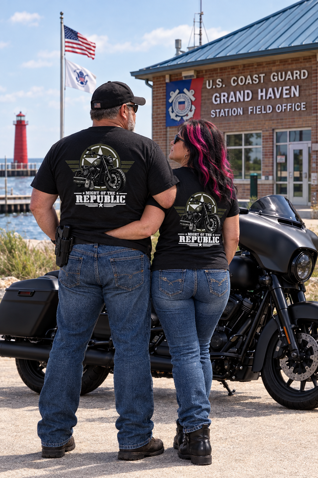 Back of black Might of The Republic tees at the Grand Haven lighthouse