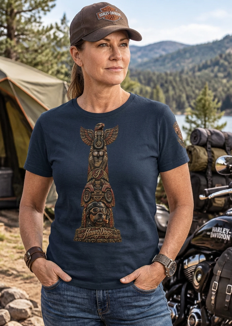 Man in the navy Totem Pooch tee with the dog totem pole graphic at a mountain campsite