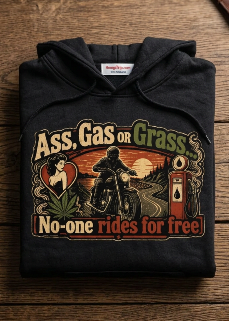 Front of the black No-One Rides for Free hoodie with the Ass, Gas or Grass graphic, laid flat on a wooden table