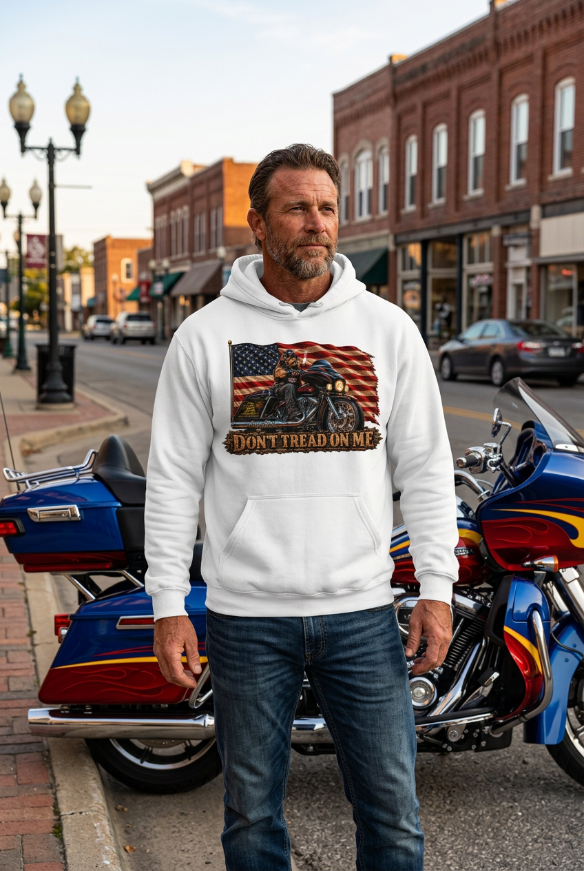 Man in the white Don't Tread Doggo premium hoodie by a touring motorcycle