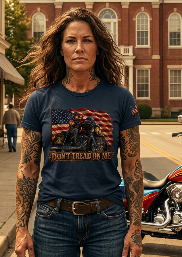 Man in the navy Don't Tread Doggo tee outside a historic courthouse with motorcycles
