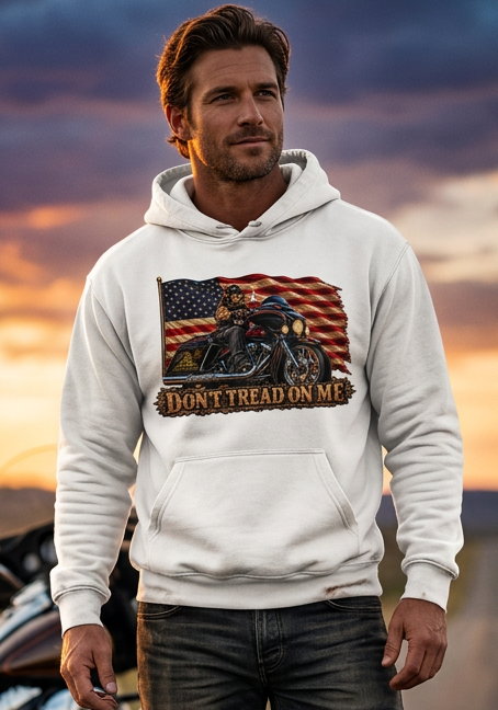 Man in the desert wearing the white HawgDogs Don't Tread Doggo Ultimate Fleece-147 Hoodie showing the front flag biker graphic