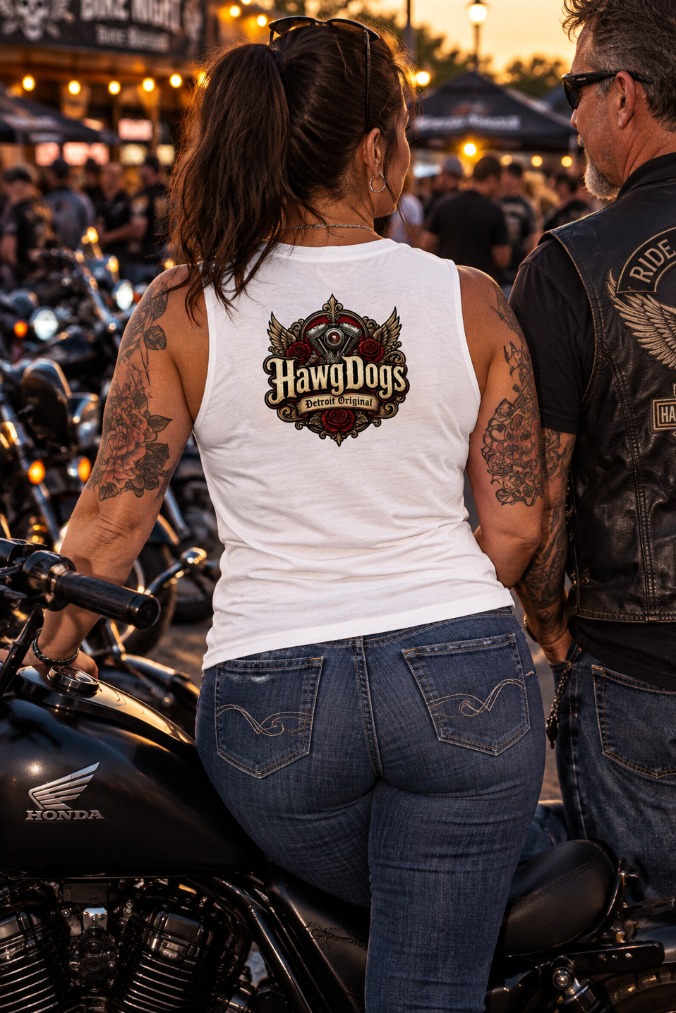 Back of the white Rebel Heart women's crewneck tank at a night rally