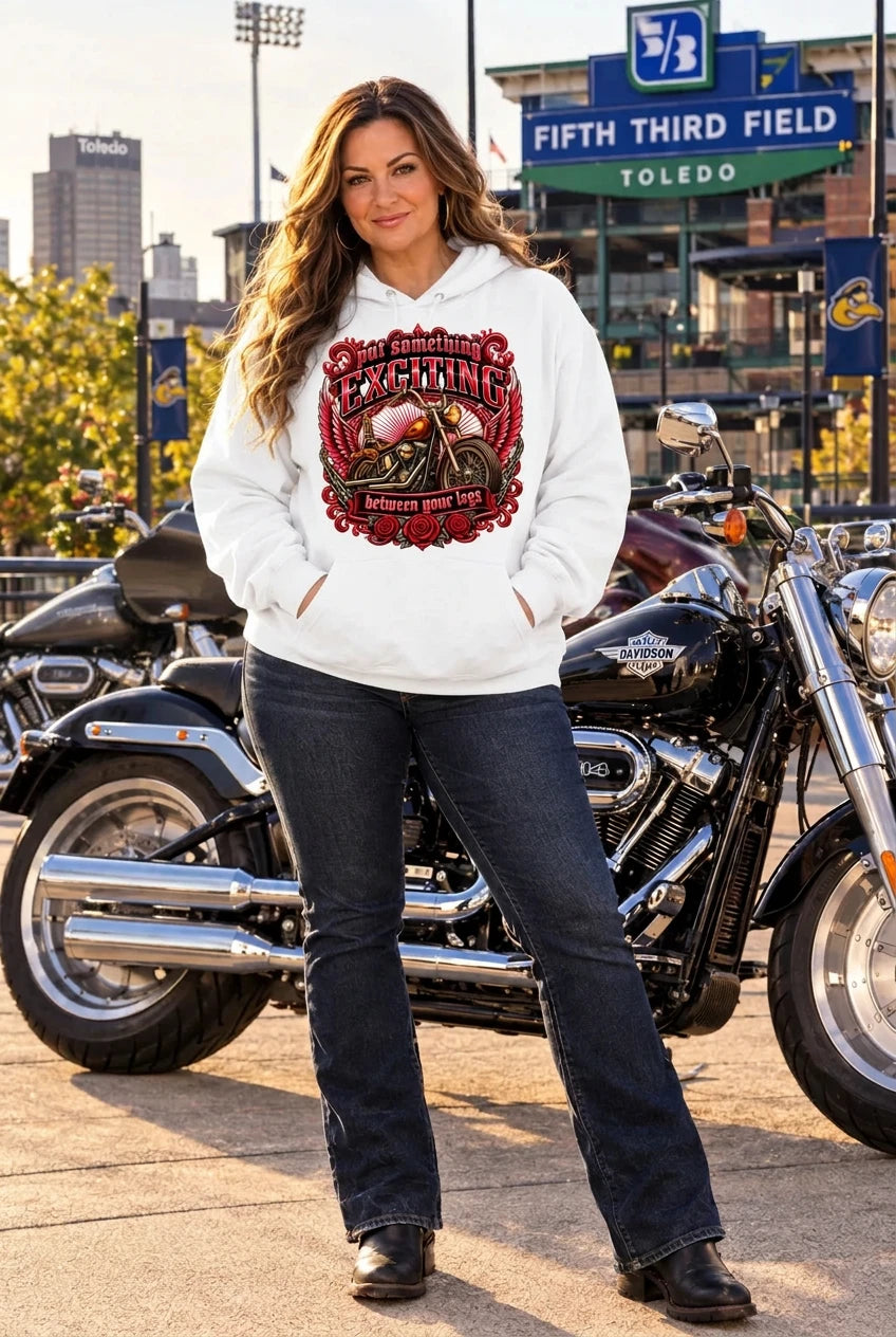 Woman in the cream Put Something Exciting premium hoodie with motorcycles downtown
